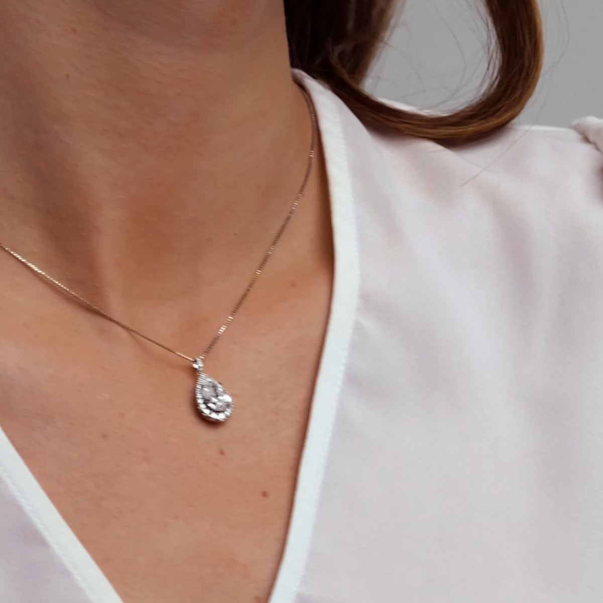 Badgley Mischka Near-Colorless 2 1/4 ctw Pear Moissanite Diamond Halo Pendant with Adjustable Chain